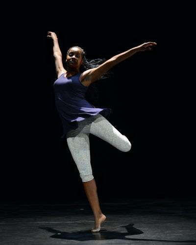 Student performing a ballet on stage