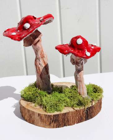 A small sculpture of "Amanita Muscaria" mushrooms