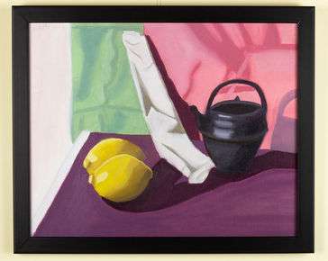 yellow lemons, black tea pot and white towel on a purple table