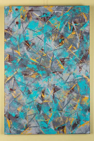 Abstract painting containing sharp edges of blue, yellow, and gray. 